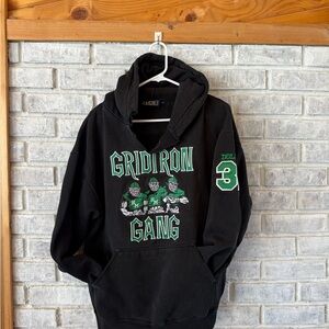 Gridiron Gang Black Hoodie with Green Accents